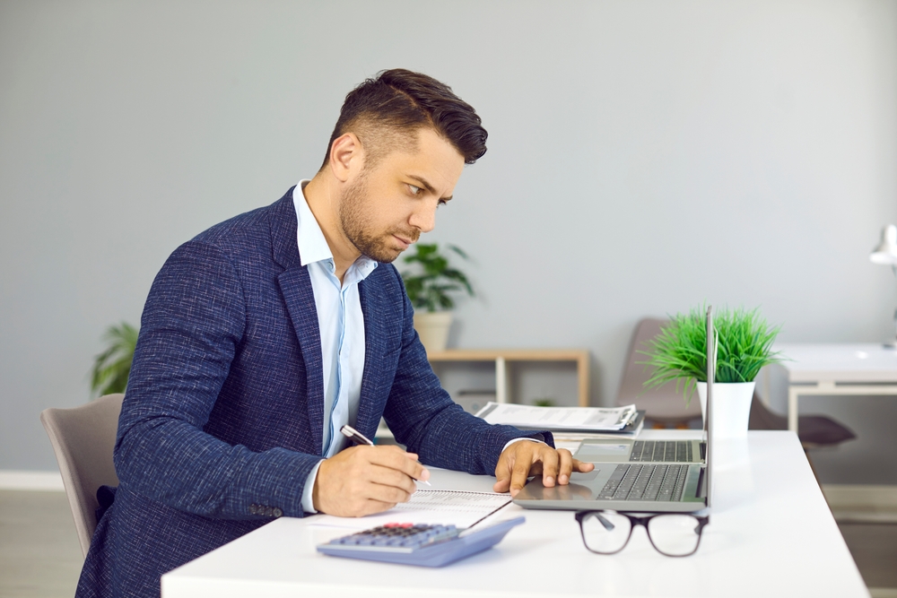 Entrepreneur working on his laptop