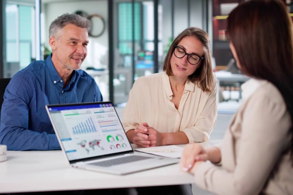 Family Estate Plans Meeting Financial Advisor And Bank Agent Together