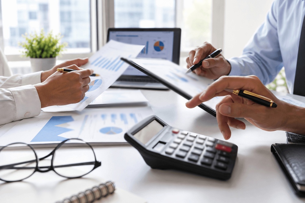 Professional accountant or financial advisor calculating taxes, analyzing financial data